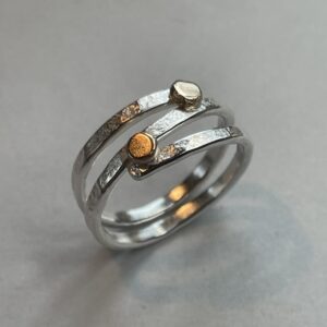 Josephine Malden: Silver overlapping ring with gold buttons