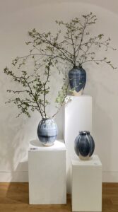 Lucy Ballard OCG: Large petal urns with new beech leaves