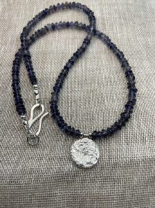 Josephine Malden: Silver reticulated moonscape on Iolite bead neacklace