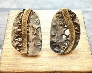 Nicola Jane: Organic Sterling silver earrings with brass detail.