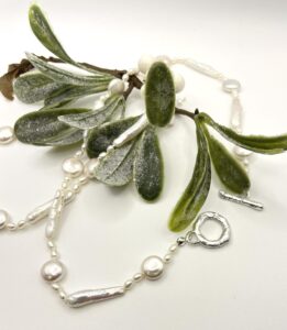 Nicola Jane: Freshwater pearls, hand knotted on silk thread with organic sterling silver clasp.