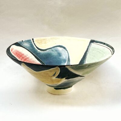 wide bowl in porcelain with abstract design in coloured glazes