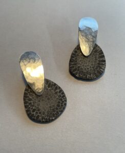 Josephine Malden: Fossilised coral stones and silver studs