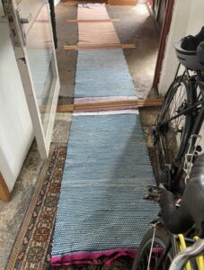 Aini Alcock: Four runners (Finnish rag rugs) just taken off the loom.