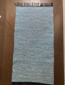 Aini Alcock: Small runner in turquoise/teal ca 64cm x 120cm