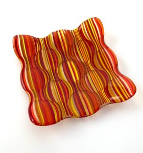 Alison Blanchard OCG, WOA: Orange square dish made out of glass stringers