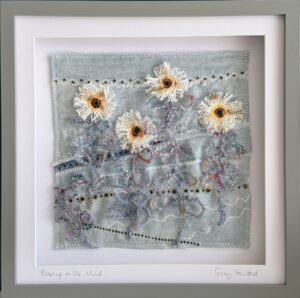 Ginny Staniford: Blowing in the Wind (upcycled textiles). Box framed. 32cm square. £60.