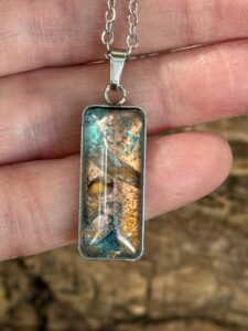 Rachel Gabriel: Suspended necklaces - unique mini wearable landscapes cultivated from copper and verdigris