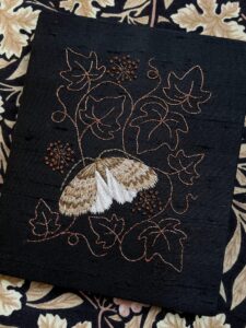 Yvette Phillips OAS: Northern Winter Moth, hand embroidery on vintage silk