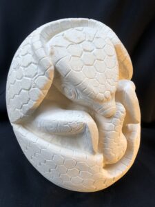 Hannah Farncombe: Maltese limestone carving of Armadillo