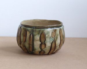 Fi Cooper: Small bowl with inlay, green copper wash, handbuilt