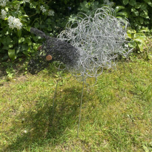 Melissa Orrom Swan WOA: Spring Lamb. Re-purposed wire. Garden sculpture approx 50cm high.