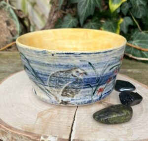 Nadine Bely-Summers: Quail in  tall grass  hand thrown stoneware pot