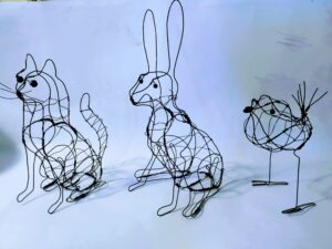 Val Hughes: Wire cat, dog, and bird. Approximately 20cm high.