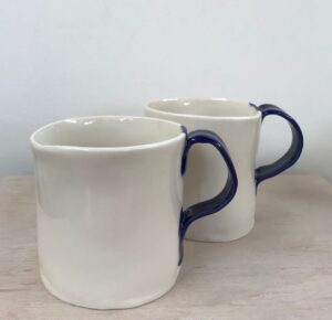 Nimmi Naidoo: blue handled porcelain mugs