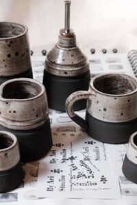 Ariadna Alvarez: Handcrafted stoneware vessels made slowly and intuitively, balancing raw, dark clay with soft, speckled glazes. My work is rooted in function, texture, and form. Pieces designed to be used daily and to age beautifully over time.