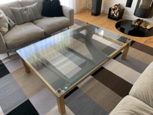 Pat Mead: Piano Table - Coffee Table featuring European Oak, toughened glass and a cast iron piano frame