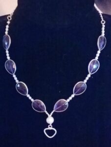 Jennie Fairweather: Fresh water cultured Pearls and Amethyst with sterling silver bevel necklace