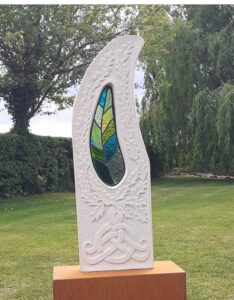 Sharon Rich WOA: "Celtic Oak". Lime stone & stained glass