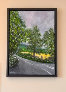 Louise Gustafson: Worton Road, near Middle Barton on a cloudy May day. Acrylic on canvas. Grey box frame. 18x25 inches. £250